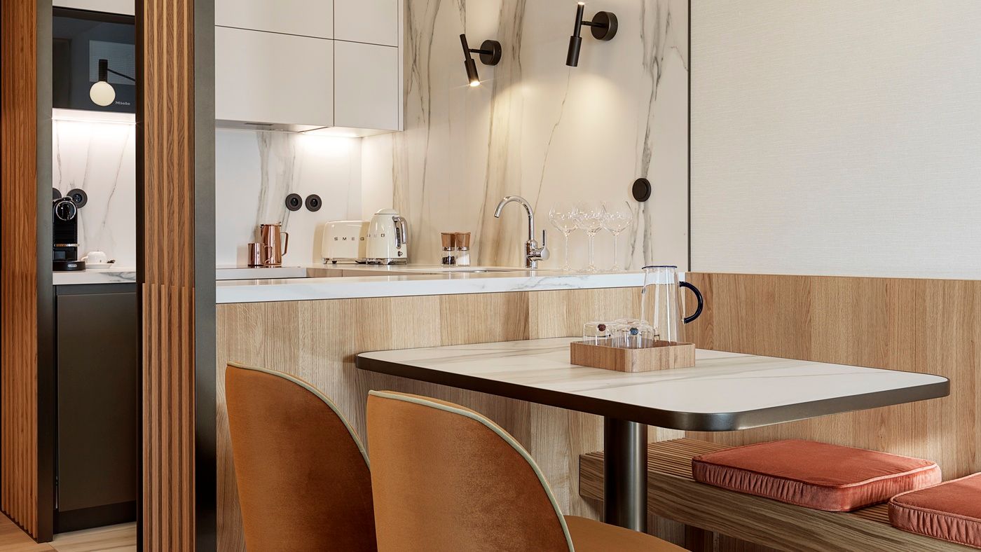 Dining area and kitchen in One-bedroom Suite with Terrace in The Julius Prague