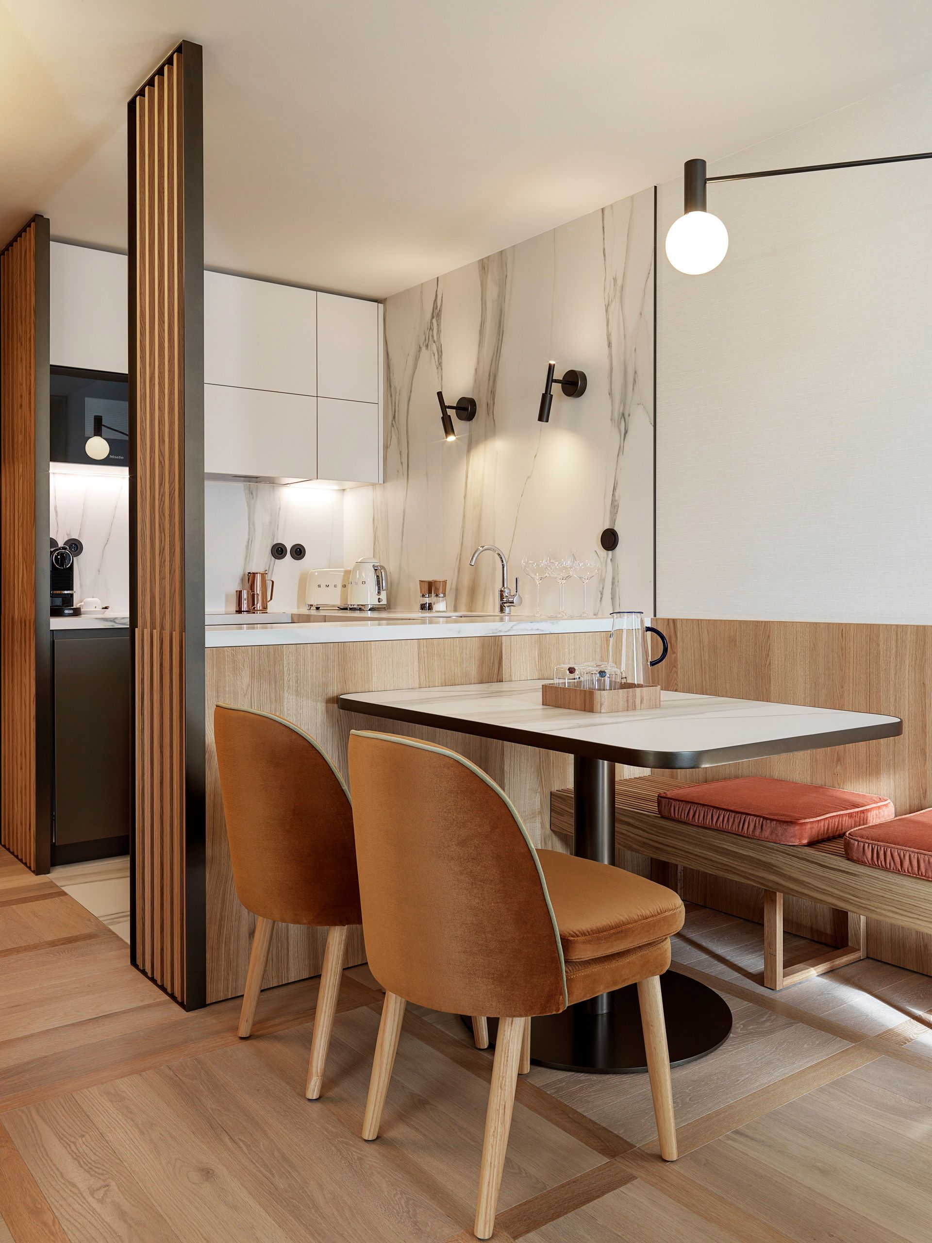Dining area and kitchen in One-bedroom Suite with Terrace in The Julius Prague 