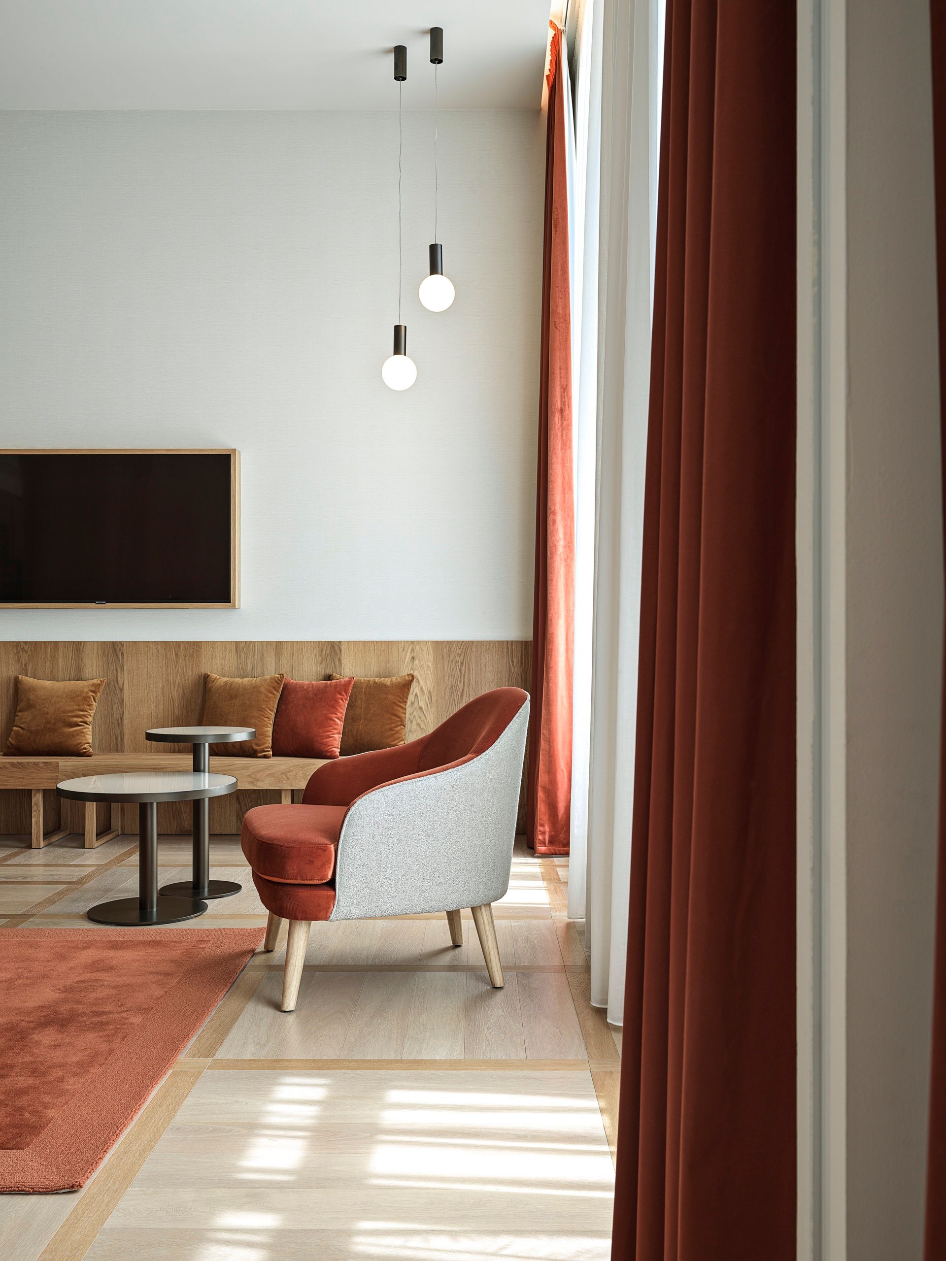 Armchair and tables in Deluxe One-bedroom Suite with Bathtub in The Julius Prague 
