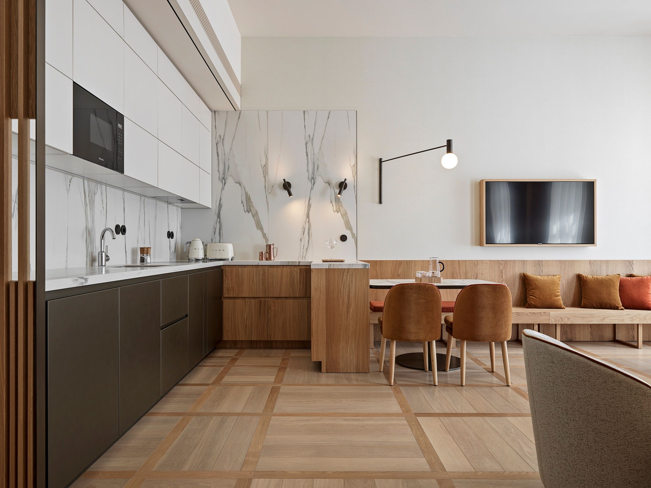 Kitchen and dining area in Deluxe One-bedroom Suite with Bathtub in The Julius Prague 