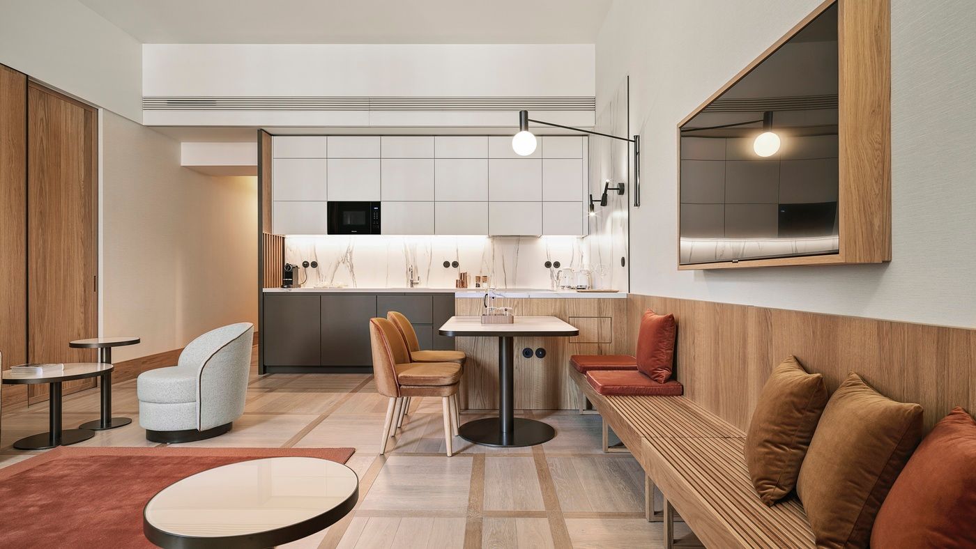 Living area with kitchen in Deluxe Suite with Bathtub in The Julius Prague