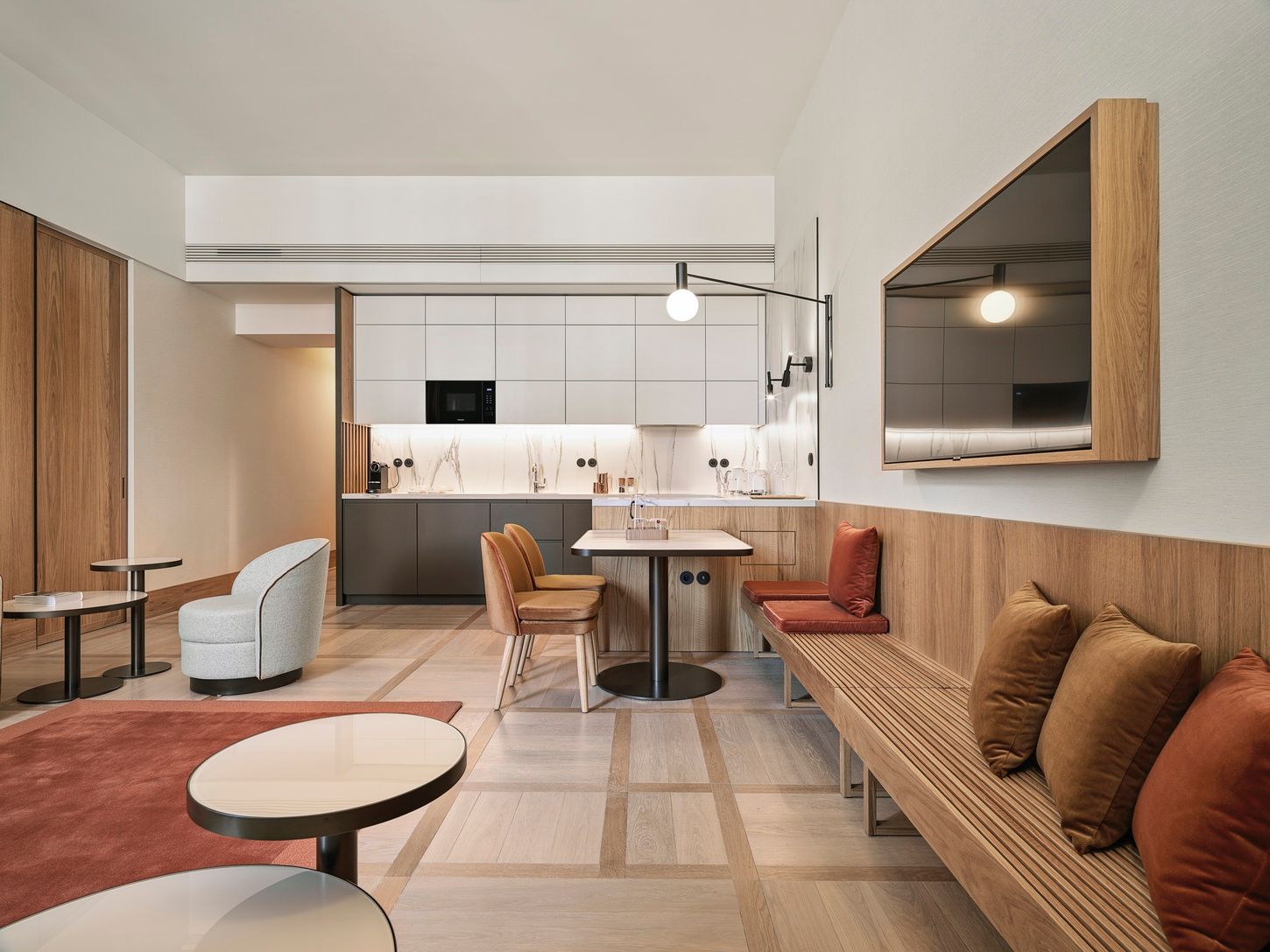 Living room and kitchen in Deluxe One-bedroom Suite in The Julius Prague