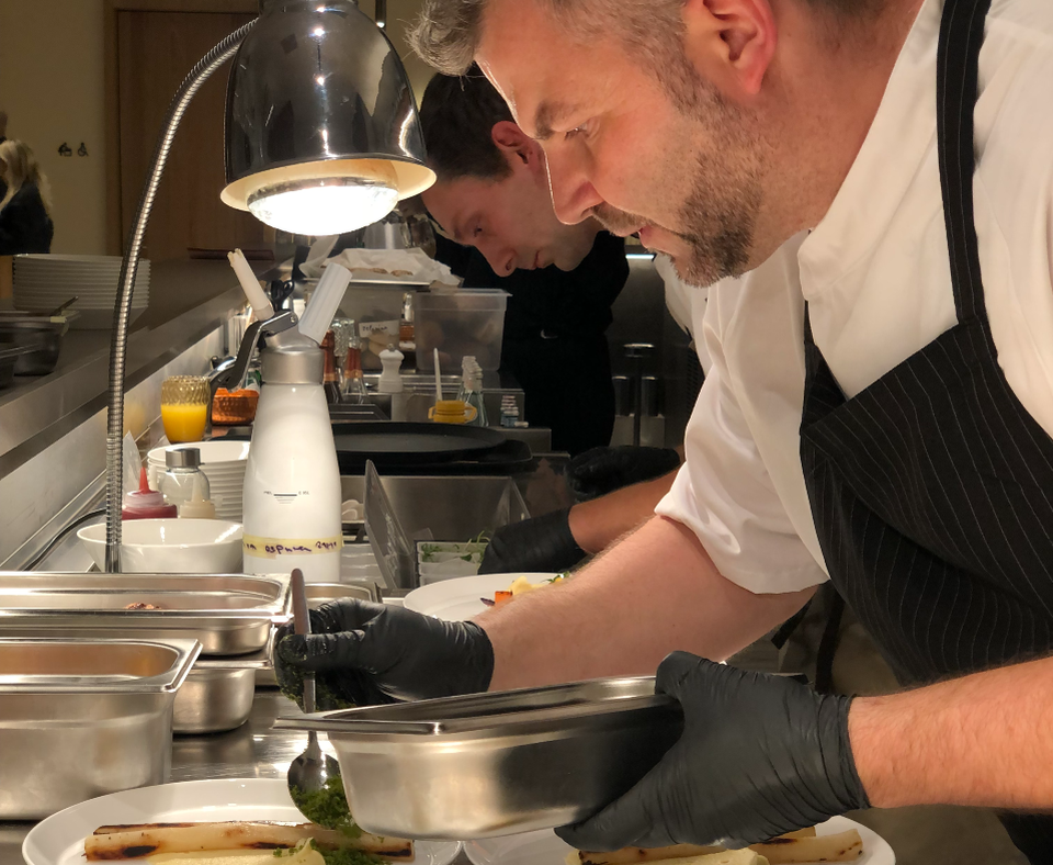 Chef Milan Dolejš preparing asparagus