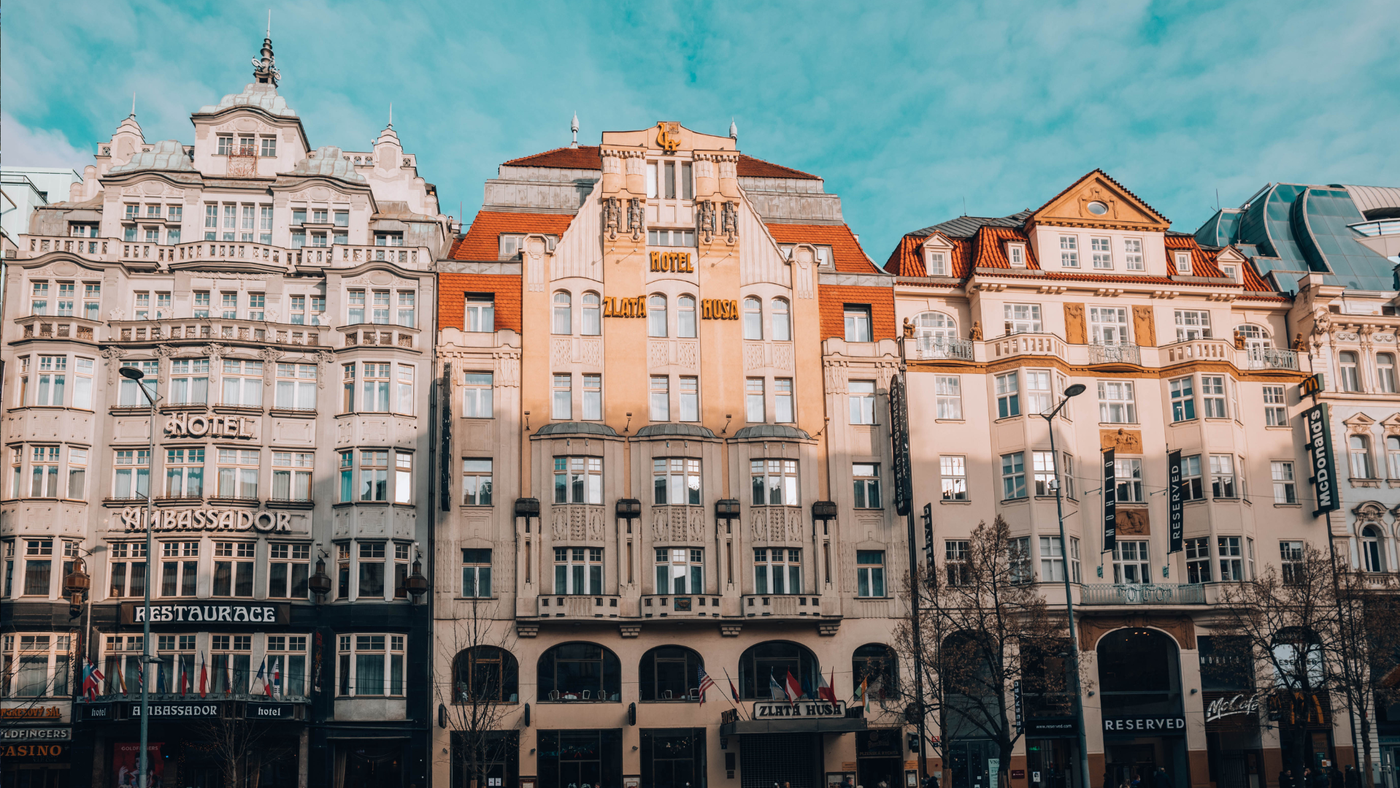 Wenceslas Square Bathed in Golden Sunlight: A sunny day transforms Wenceslas Square, casting a warm, soft glow over the buildings. The gentle colors create an inviting and serene atmosphere, showcasing the square's architectural beauty and historical importance.